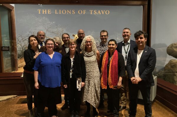 Department Faculty in front of Field Museum Tsavo Lions exhibit